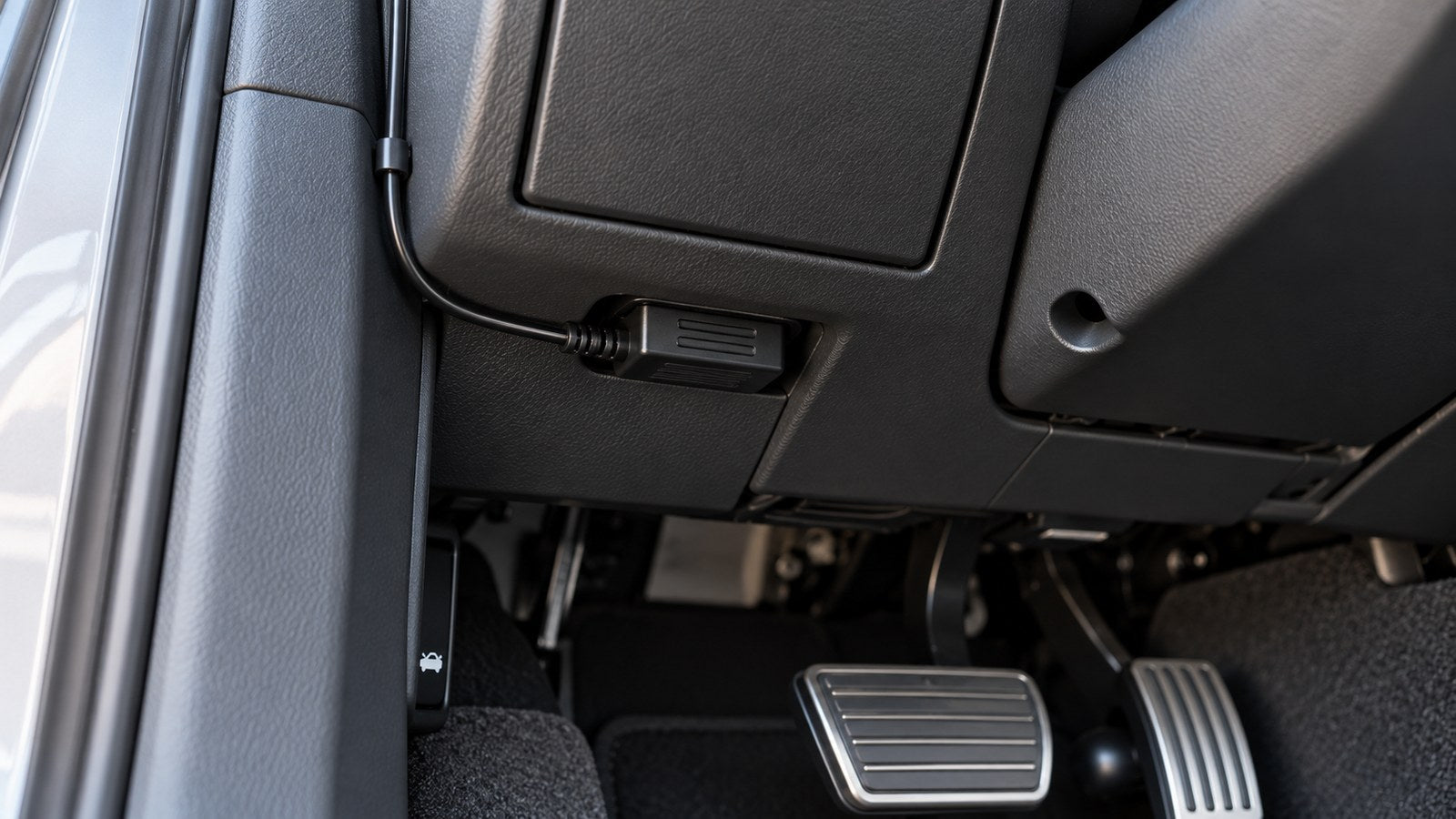 Route the cable & plug into the OBD-II port